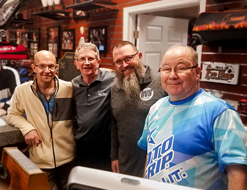The Don Mitchell Pro Shop owners and operators at the shop counter
